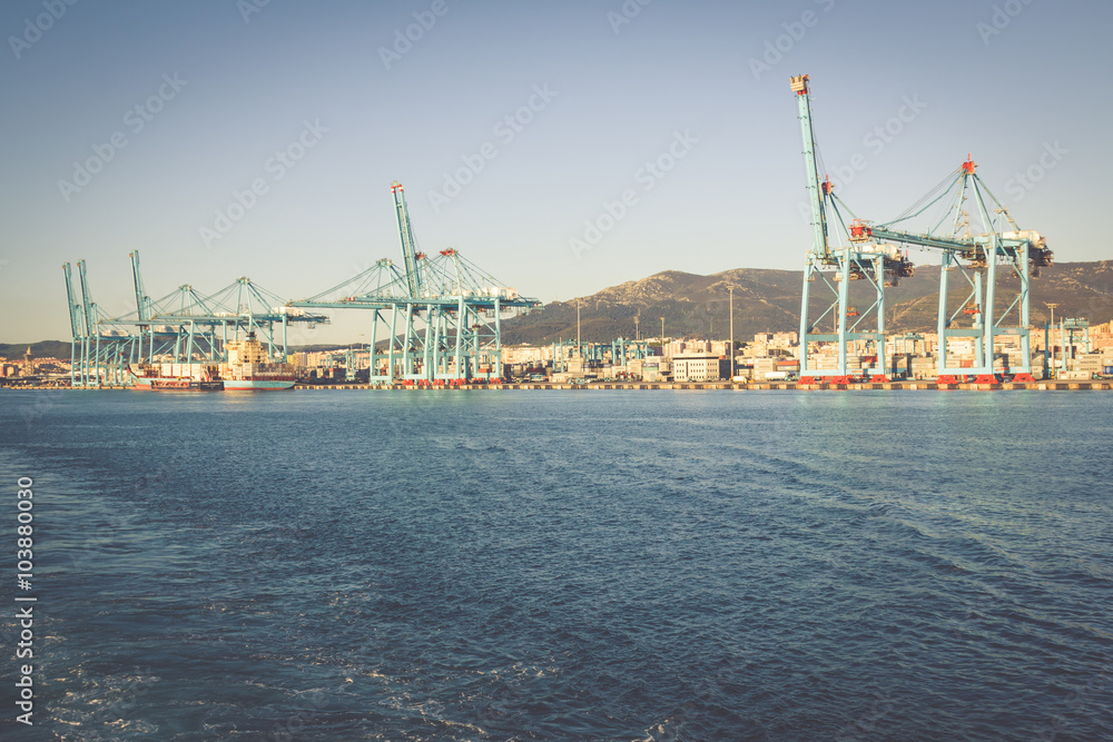 ALGECIRAS, SPAIN - MAY 1,2013: Container terminal in the industr ALGECIRAS, SPAIN - MAY 1,2013: Container terminal in the industr