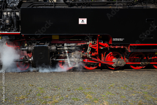 Red and black steam train