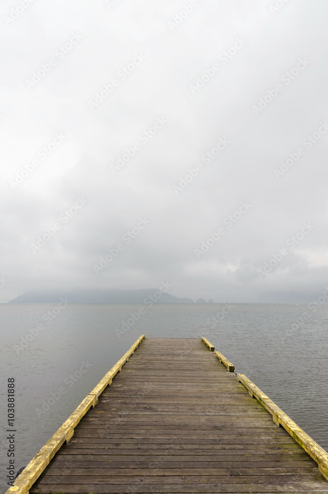 Harrison Lake Pier. A pier leading to nowhere in Harrison, British Columbia, Canada. Solitude, serenity, and an idyllic atmosphere is what's on tap here.