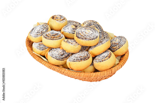 Homemade cookie roll with poppy in a wattled basket