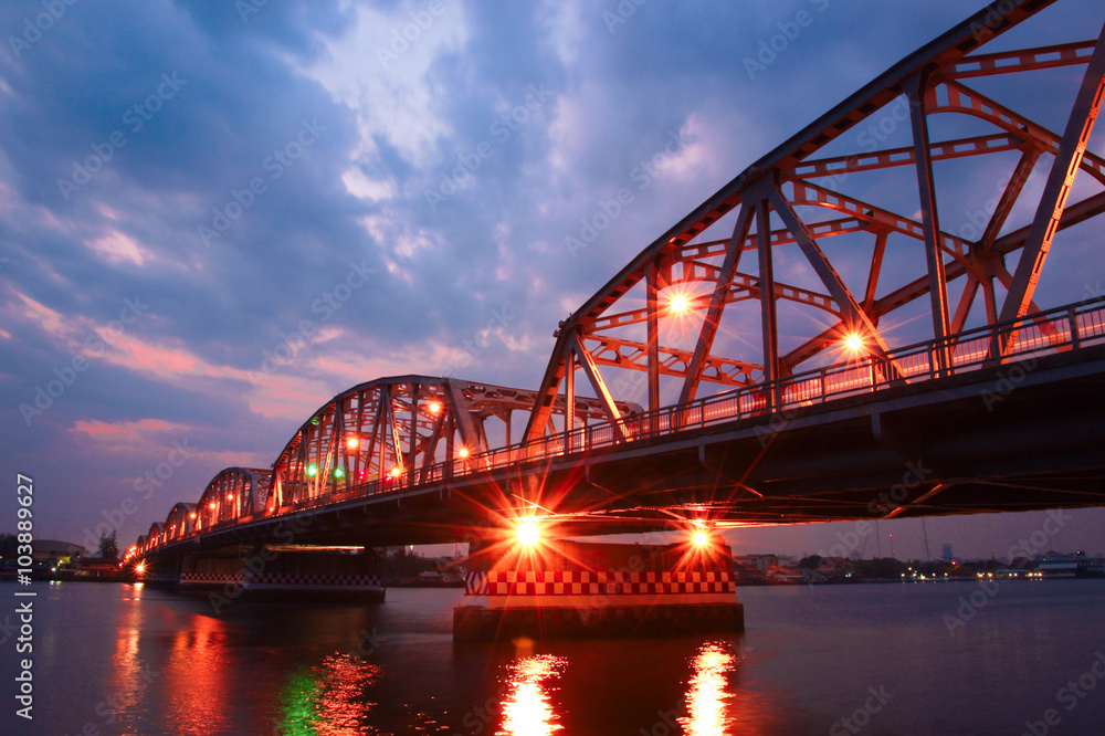 Krung Thon Bridge, is a bridge over the Chao Phraya River Bangkok Thailand with sunrise