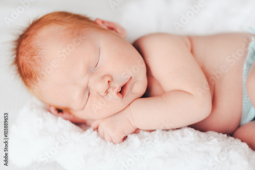 Newborn baby peacefully sleeping