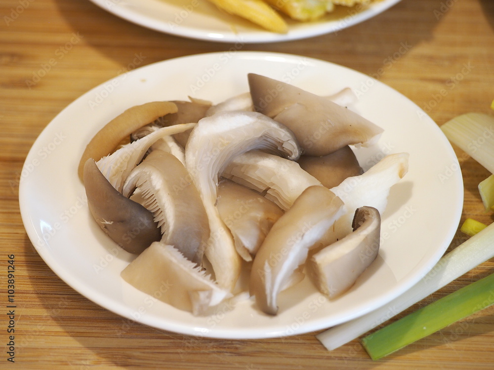 Fresh cut of oyster mushroom - typical ingredient of asian cuisine