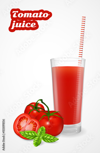 Ripe tomatoes on a branch and tomato juice in a glass with striped straw.