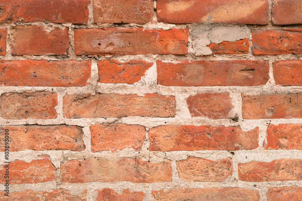 Fototapeta premium Brick texture with scratches and cracks