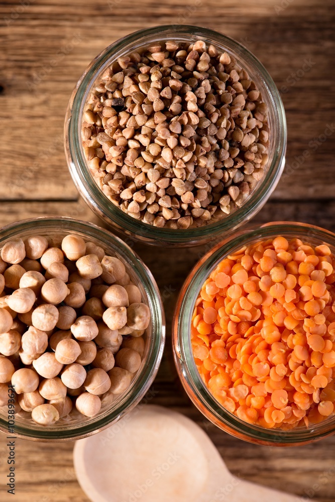 Glass jars with three kinds of legumes Glass jars with three kinds of legumes