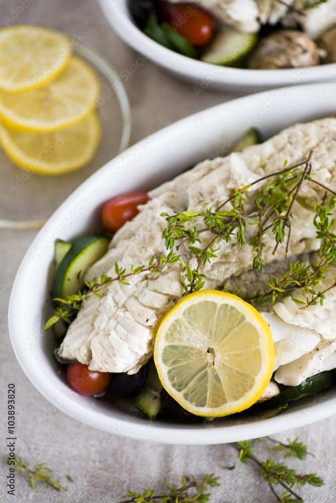 Baked fish with vegetables and white wine and thyme Baked fish with vegetables and white wine and thyme