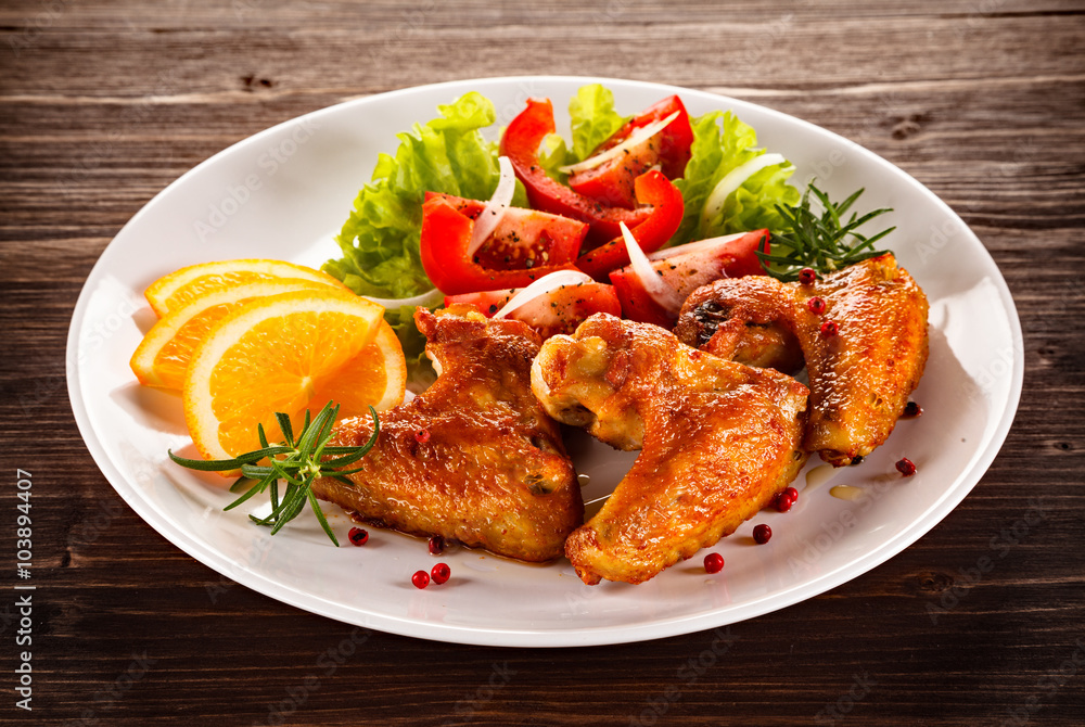Grilled chicken wings and vegetables Grilled chicken wings and vegetables