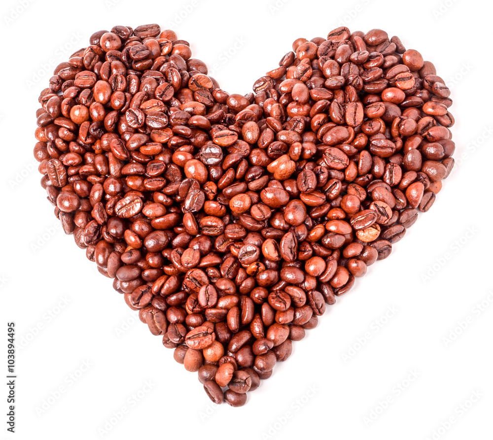 Background from coffee beans in the form of heart. Background from coffee beans in the form of heart.