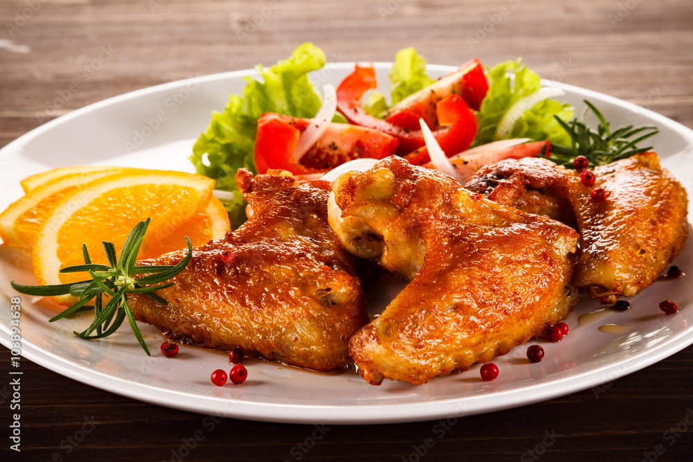 Grilled chicken wings and vegetables Grilled chicken wings and vegetables