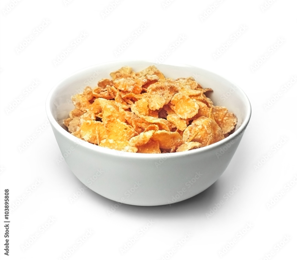 Cornflakes in a bowl, isolated on white Cornflakes in a bowl, isolated on white