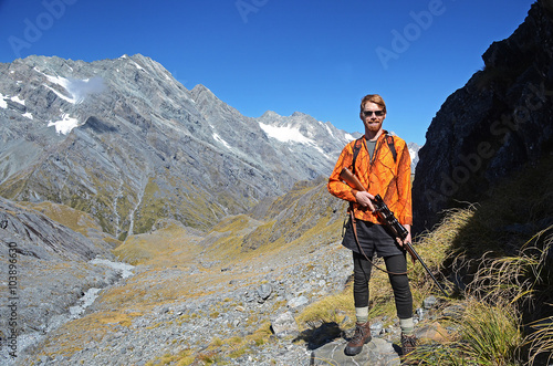 hunter in mountains new zealand