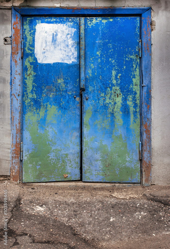 old weathered blue door in russia close up old weathered blue door in russia close up