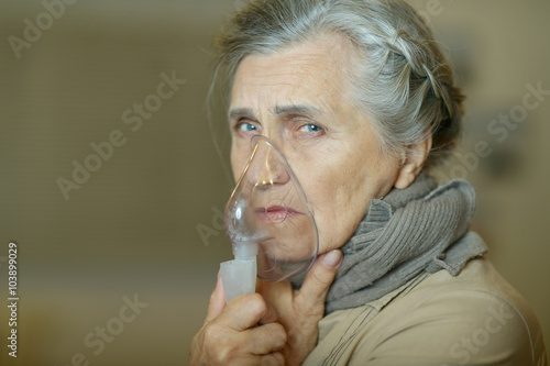 Woman making inhalation