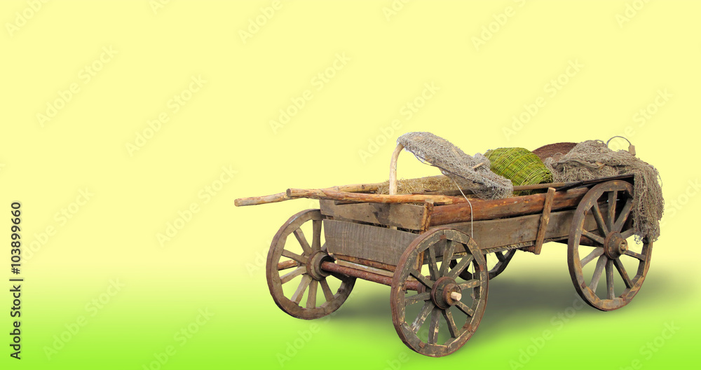 Fototapeta premium Rural cart for the horse on a yellow background.