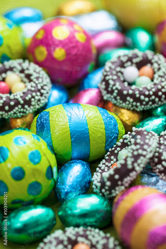 Fototapeta premium Close up of colorful easter eggs and sweets