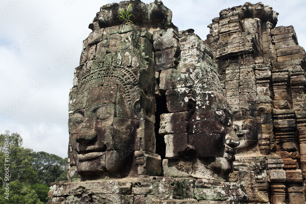 Faces of King Yayavarmann VII on the beautiful Bayon temple, Ang Faces of King Yayavarmann VII on the beautiful Bayon temple, Ang