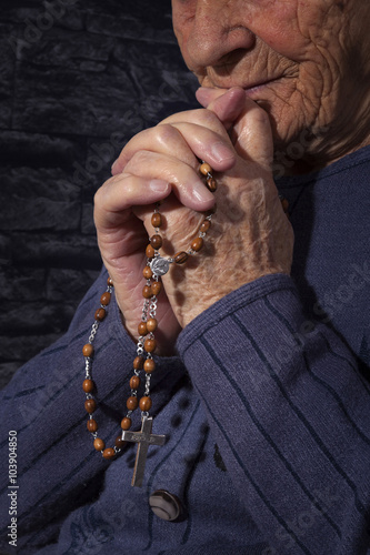 Grandmother praying.