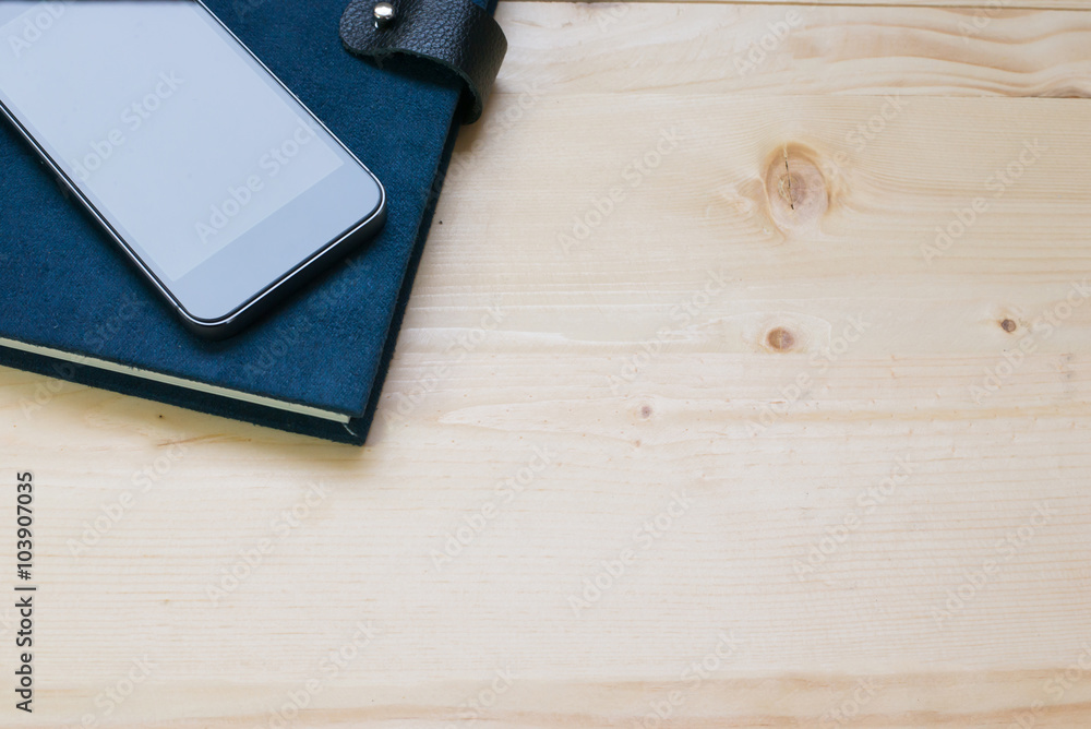 blank notebook on desk background. blank notebook on desk background.
