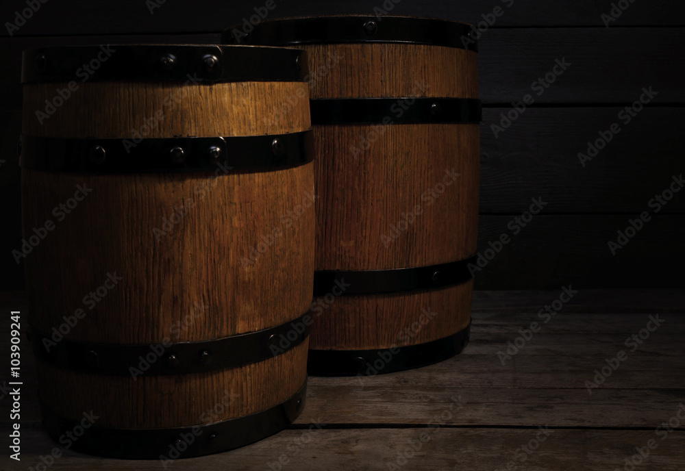 Fototapeta premium Two old wooden wine barrels, closeup