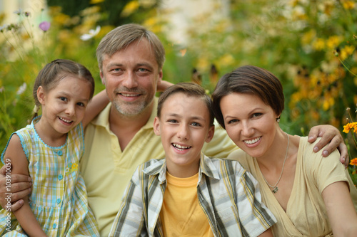 Family resting in  summer park
