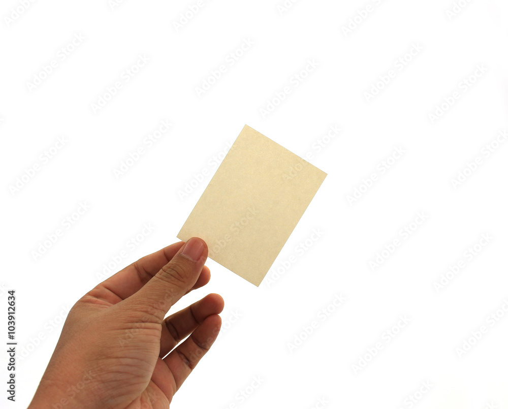 Fototapeta premium hand holding blank business card in hand. Isolated on white