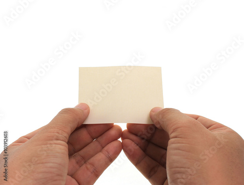 hand holding blank business card in hand. Isolated on white