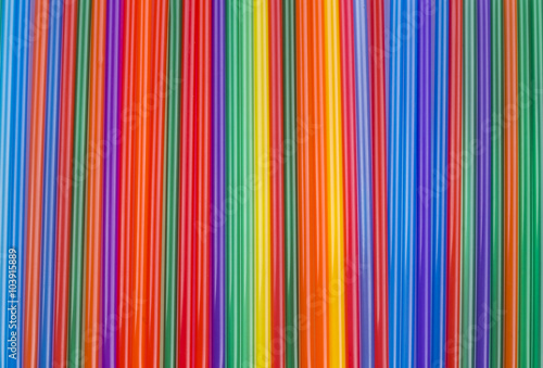 texture of colored cocktail sticks. colored vertical stripes.