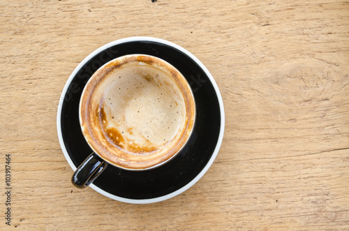 black coffee cup on wood table