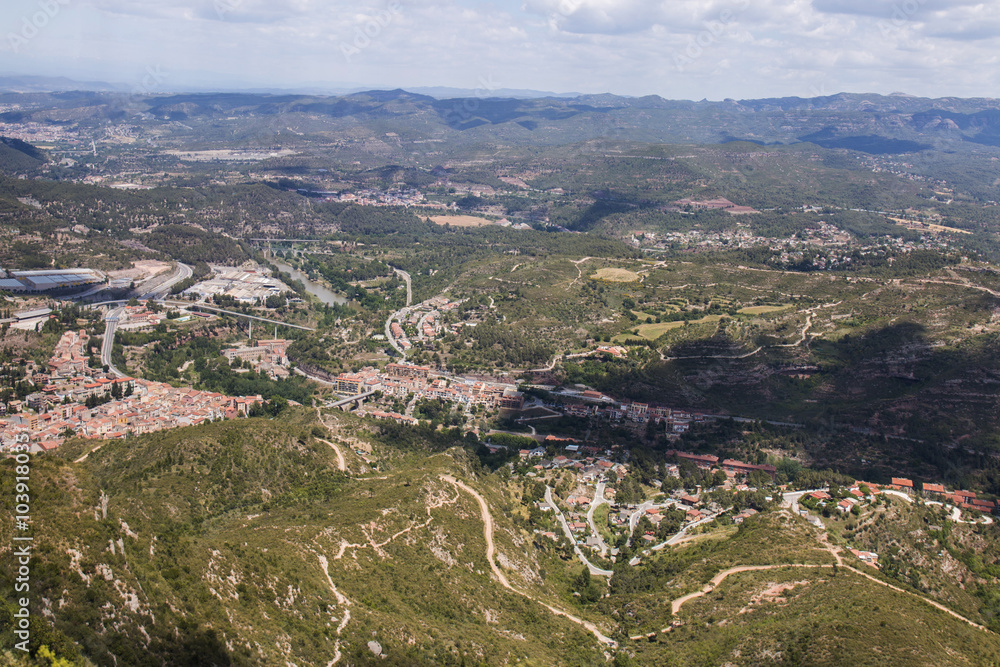 Wide view from the beautiful mountains of Montserrat where a famous benedictine abbey is located near Barcelona city, Spain.