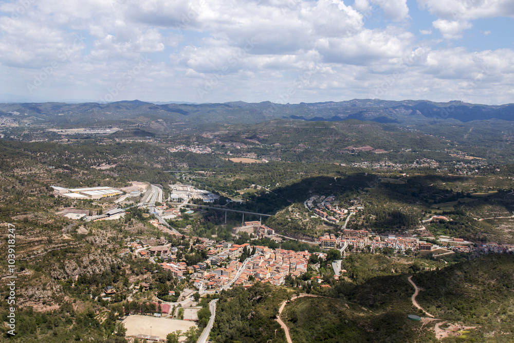 Wide view from the beautiful mountains of Montserrat where a famous benedictine abbey is located near Barcelona city, Spain.