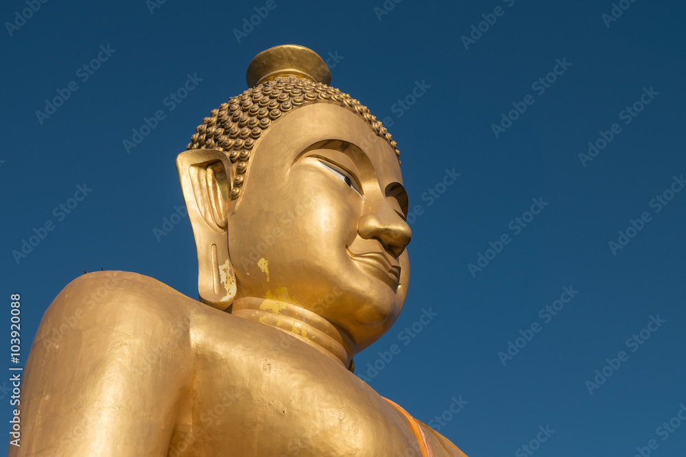 Close-up,The huge golden Buddha at khao kiaw temple in ratchabur