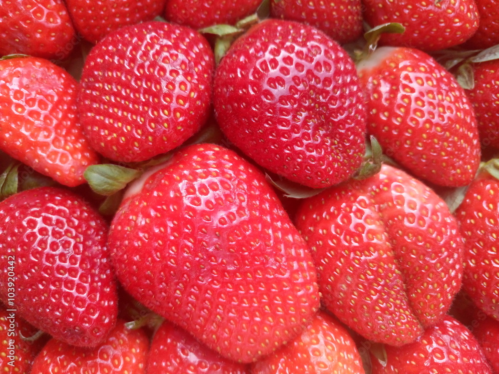 Directly above shot of fresh strawberries for sale Directly above shot of fresh strawberries for sale