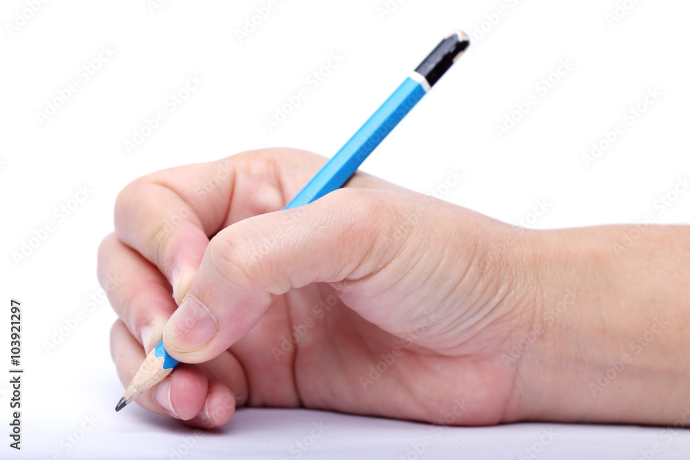 hand using pencil on white background. hand using pencil on white background.