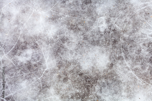ice surface of frozen pond in winter