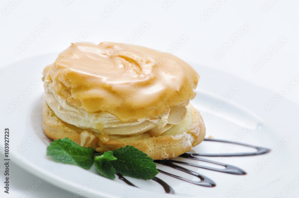 cream cake with caramel and topping on white plate, sweet dessert, patisserie, shop cream cake with caramel and topping on white plate, sweet dessert, patisserie, shop