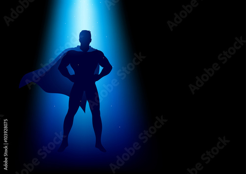 Superhero standing under the blue light