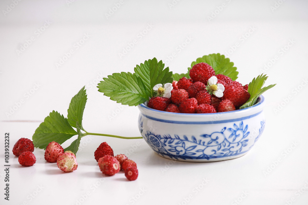 Strawberries on white table