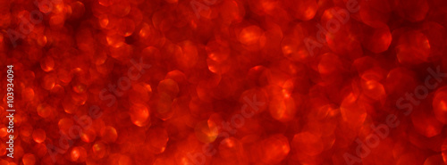 Shiny red glitter bokeh christmas background