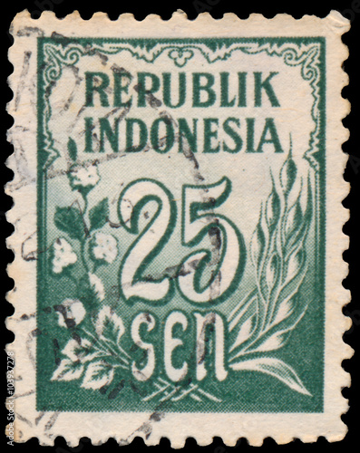 Obraz na płótnie Stamp printed in Indonesia shows image of floral and leaf patter w salonie