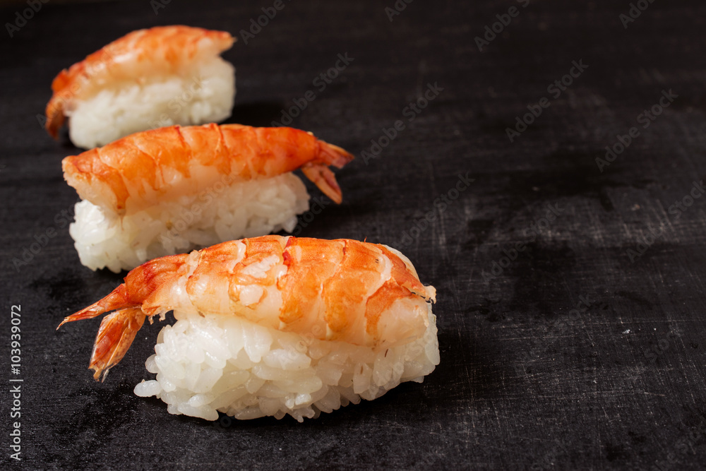 Nigiri with king prawn black background Nigiri with king prawn black background