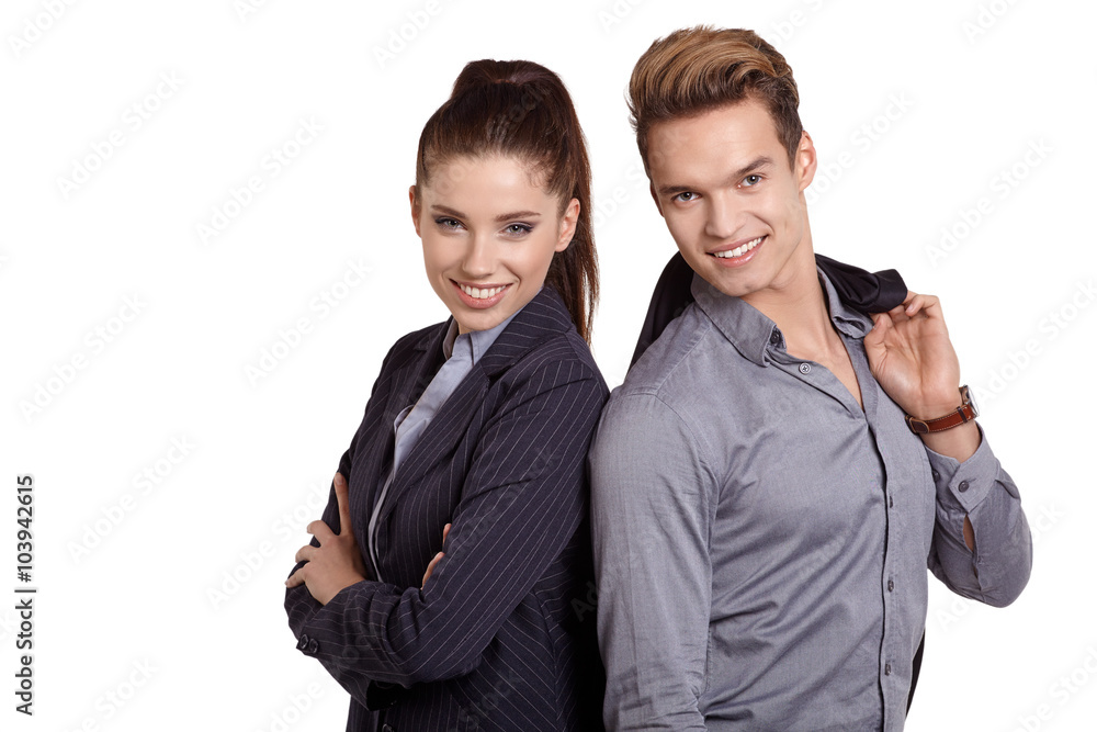 Proud business couple looking at camera isolated on white backgr Proud business couple looking at camera isolated on white backgr