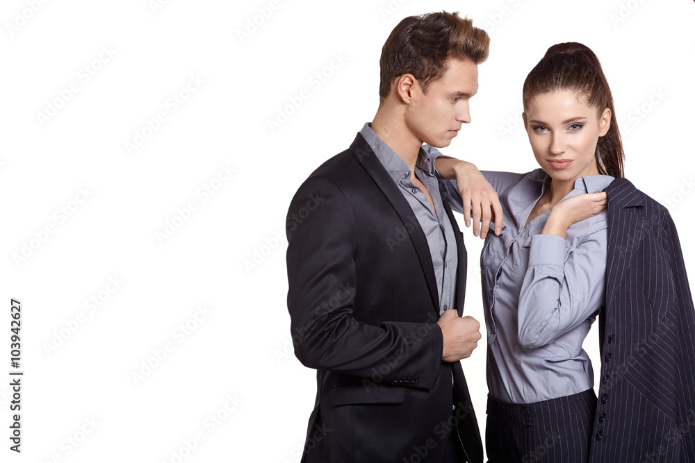 Proud business couple looking at camera isolated on white backgr Proud business couple looking at camera isolated on white backgr