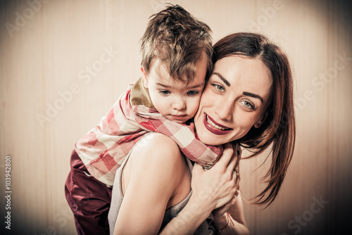 loveful mother and son portrait indoor photo