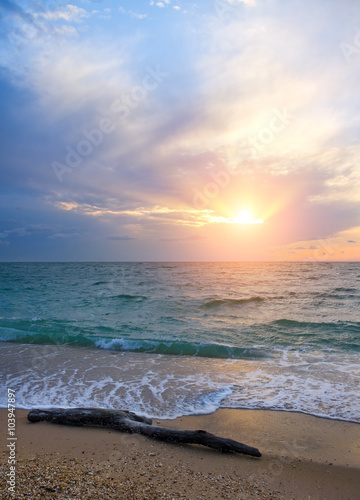 Sunset on the beach in summer time