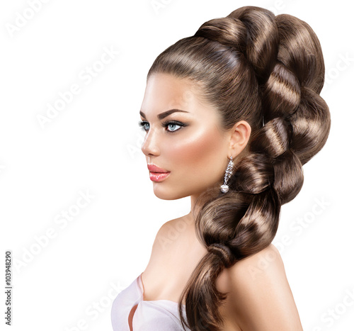 Hair braid. Beautiful woman with healthy long hair