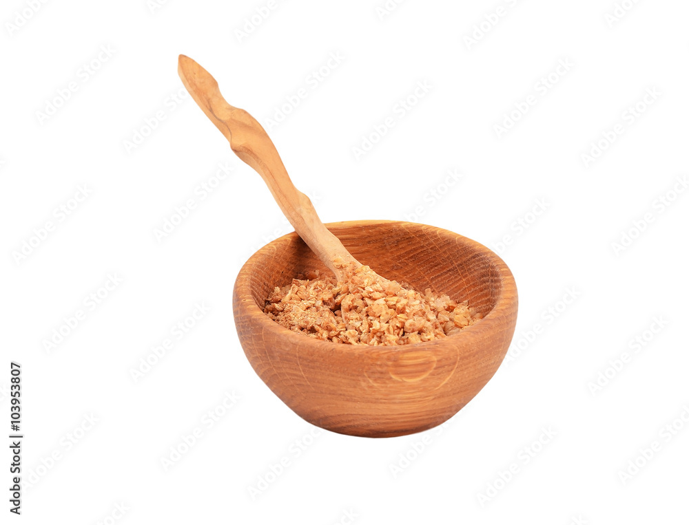 Buckwheat flocks in a wooden bowl Buckwheat flocks in a wooden bowl