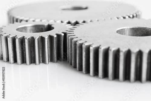 close up gears set for unity meaning on isolated background