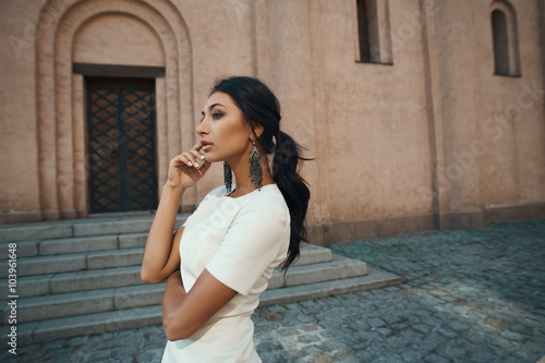 lady in dress against ancient building with thoughtful look © dmitry_zubarev