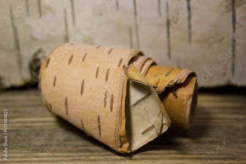 Obraz na plátně Roll of birch Bark on wooden